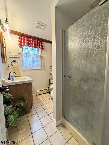 60 Plotts Road Newton, NJ 07860 - Photo 16 of 36 a bathroom with a sink and a mirror