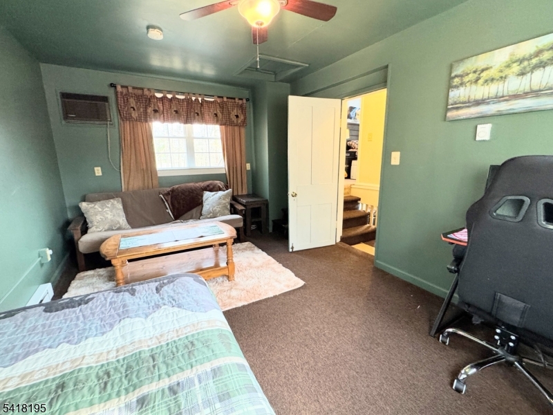 60 Plotts Road Newton, NJ 07860 - Photo 17 of 36 a bedroom with furniture and a window