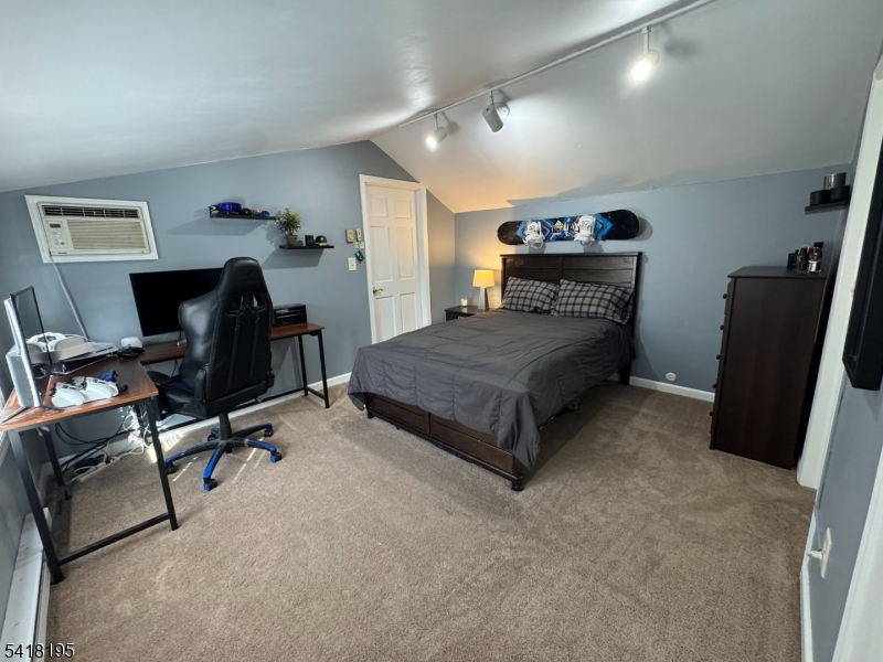 60 Plotts Road Newton, NJ 07860 - Photo 19 of 36 a bedroom with a bed and furniture