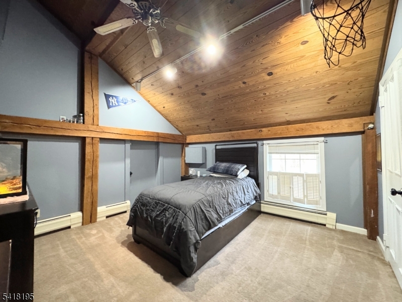 60 Plotts Road Newton, NJ 07860 - Photo 21 of 36 a spacious bedroom with a bed and a window