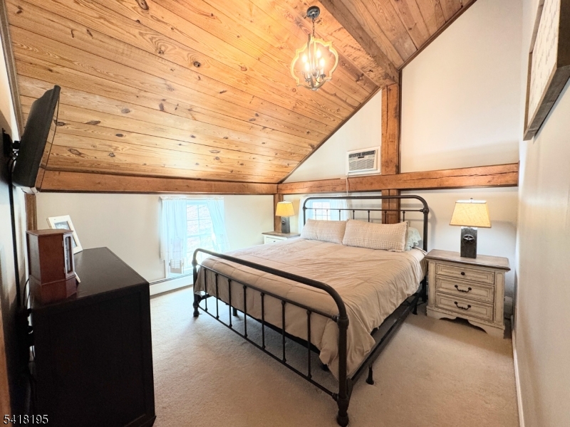 60 Plotts Road Newton, NJ 07860 - Photo 25 of 36 a bedroom with a bed next to a window