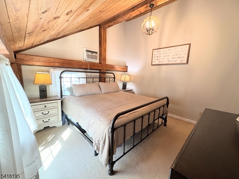 60 Plotts Road Newton, NJ 07860 - Photo 26 of 36 a view of a bedroom with furniture and window