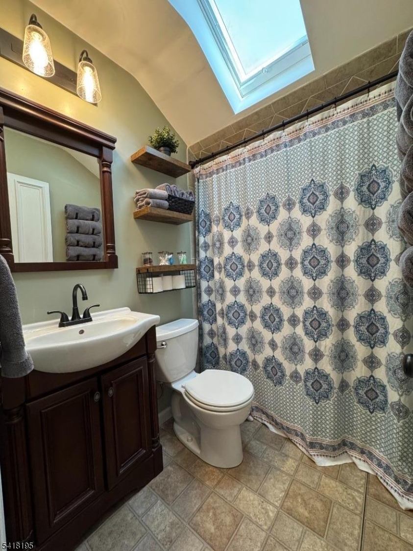 60 Plotts Road Newton, NJ 07860 - Photo 27 of 36 a bathroom with a sink toilet and shower