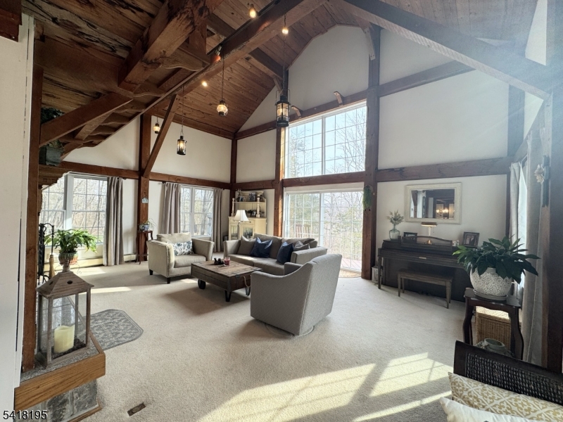 60 Plotts Road Newton, NJ 07860 - Photo 3 of 36 a living room with furniture and a large window