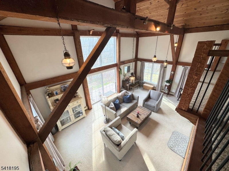 60 Plotts Road Newton, NJ 07860 - Photo 32 of 36 a living room with furniture and a window