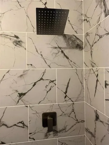 a view of a chairs and table in a backyard