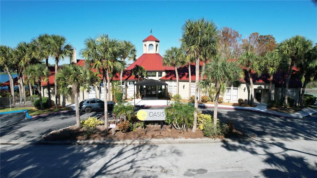 241 Afton Square, Unit 205 Altamonte Springs, FL 32714 - Photo 14 of 32 a view of a chairs and table in a backyard