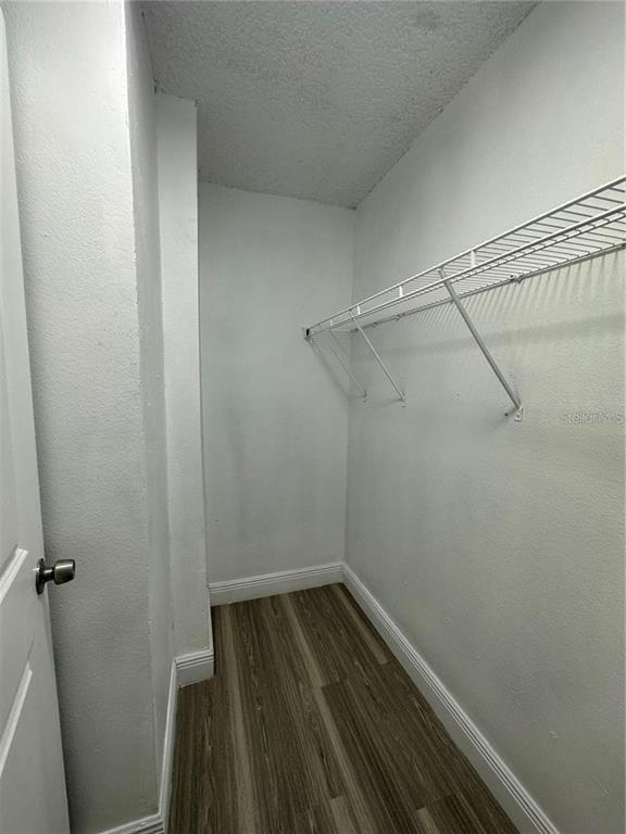 241 Afton Square, Unit 205 Altamonte Springs, FL 32714 - Photo 9 of 32 a view of a room with racks on the wall