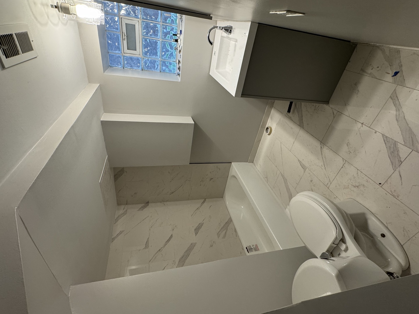 2617 West Rascher Avenue, Unit G Chicago, IL 60625 - Photo 13 of 15 a living room with furniture and a flat screen tv