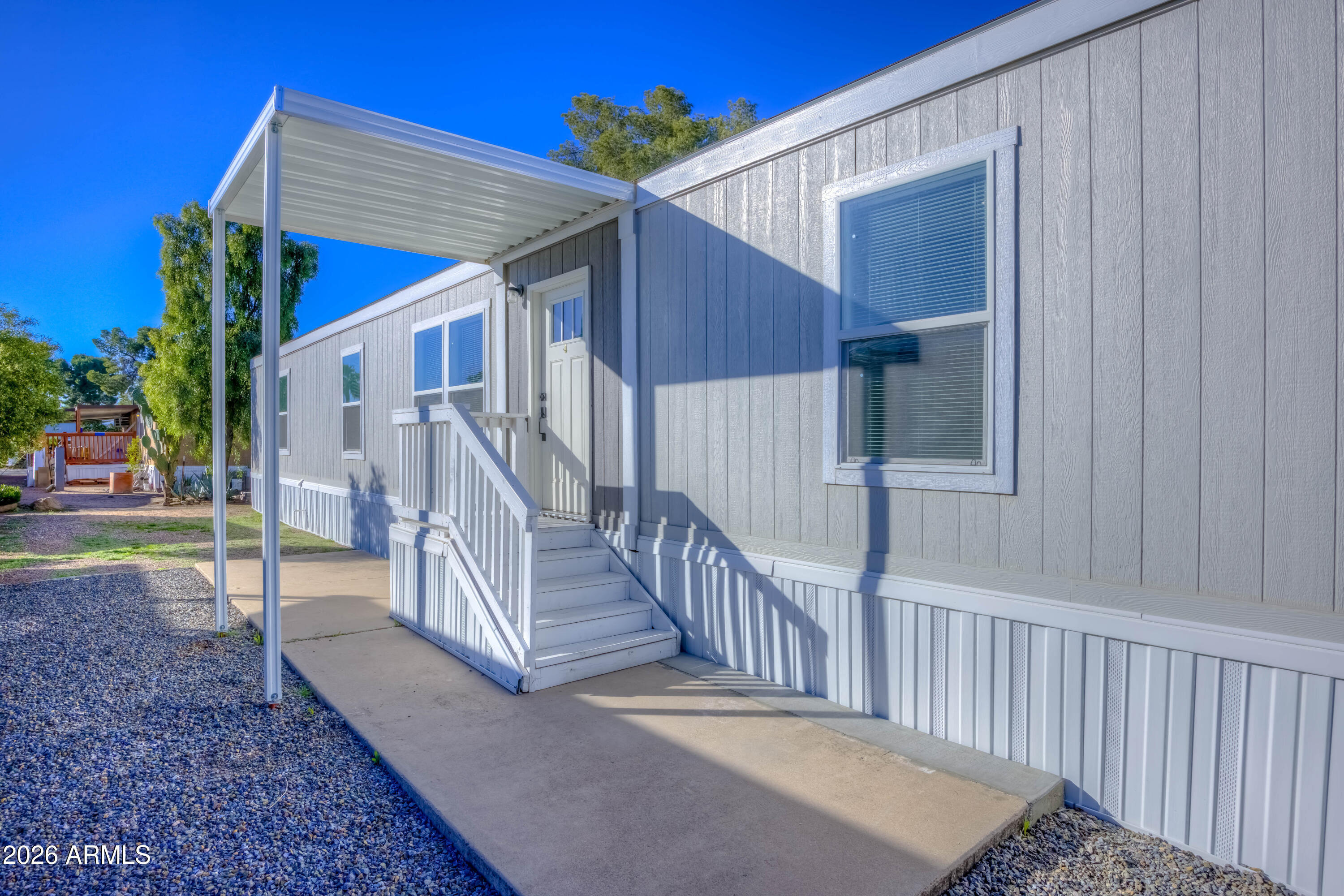 1325 West Silverlake Road, Unit 9 Tucson, AZ 85713 - Photo 20 of 29 a view of a house with a yard