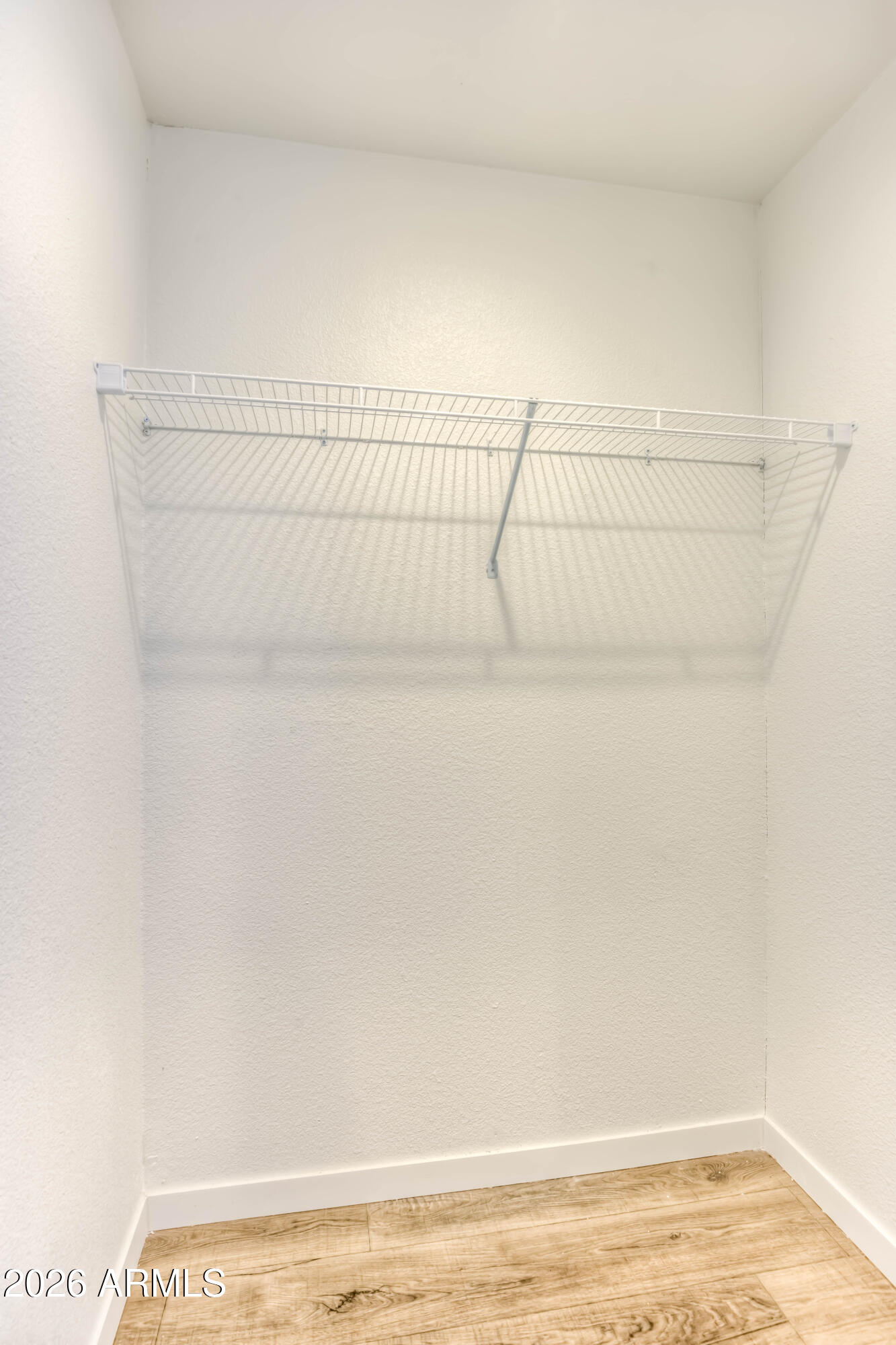 1325 West Silverlake Road, Unit 9 Tucson, AZ 85713 - Photo 10 of 29 a view of a room with racks on the wall