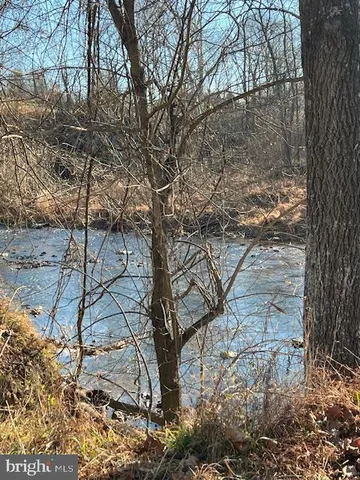 a view of balcony with wooden floor