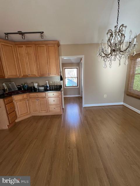2834 East Boss Arnold Road Jefferson, MD 21755 - Photo 14 of 16 a view of a kitchen with a sink and dishwasher with wooden floor