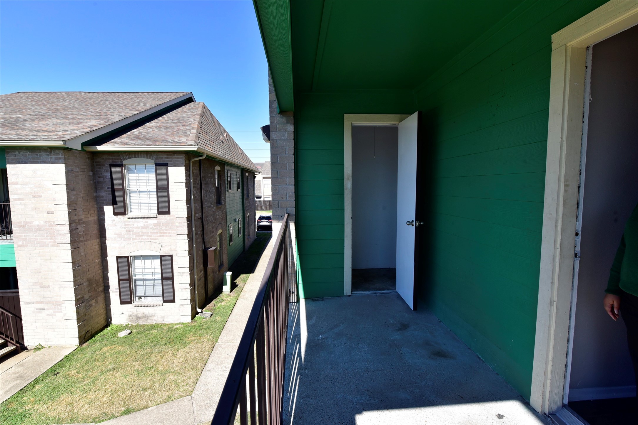 14403 Pavilion Point, Unit 488 Houston, TX 77083 - Photo 6 of 15 a view of a house with wooden floor and stairs