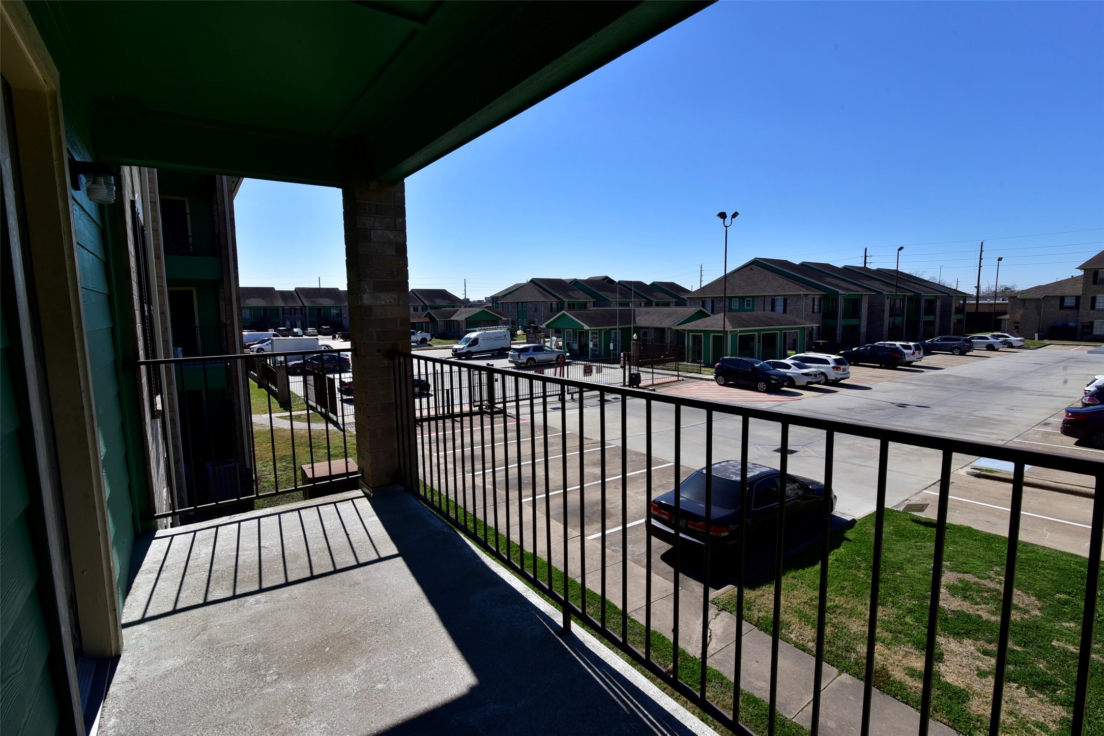 14403 Pavilion Point, Unit 488 Houston, TX 77083 - Photo 7 of 15 a view of a balcony with an outdoor space