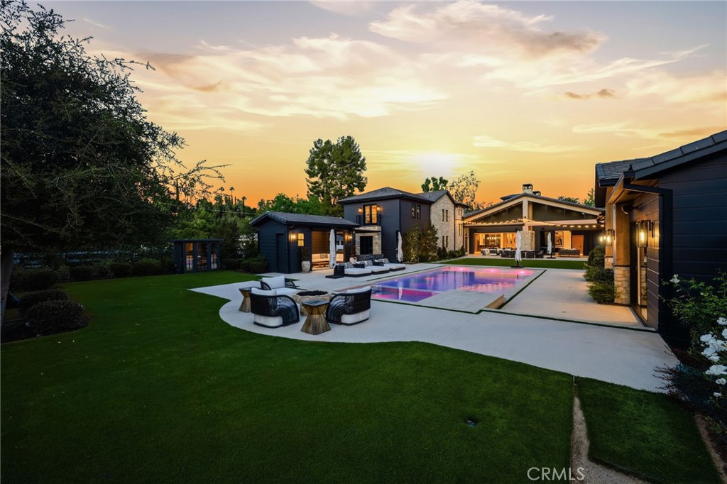 5241 Twin Oaks Road Hidden Hills, CA 91302 - Photo 4 of 69 a view of a house with sitting area and garden