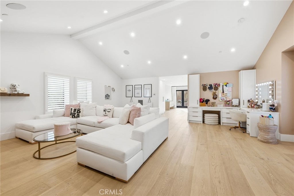 5241 Twin Oaks Road Hidden Hills, CA 91302 - Photo 53 of 69 a living room with furniture and a large window