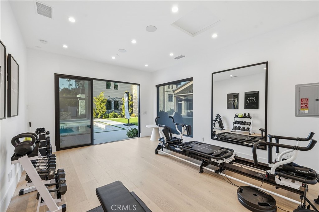 5241 Twin Oaks Road Hidden Hills, CA 91302 - Photo 57 of 69 a view of a room with gym equipment