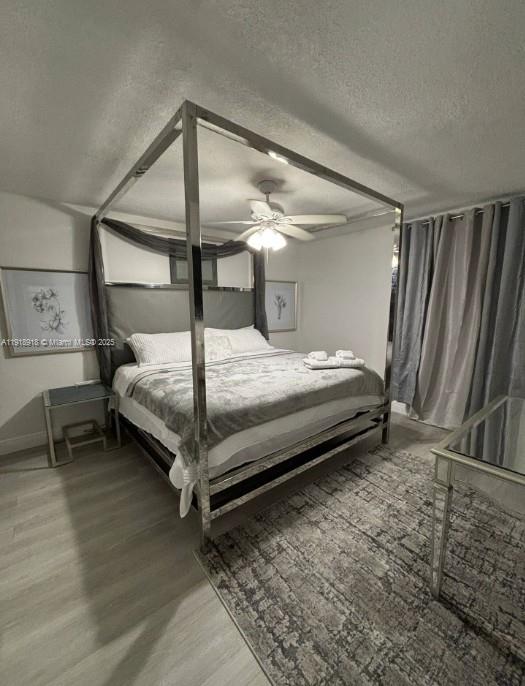 St. Lucie Estates-Broadway Stuart, FL 34996 - Photo 4 of 12 a bedroom with a bed and a table