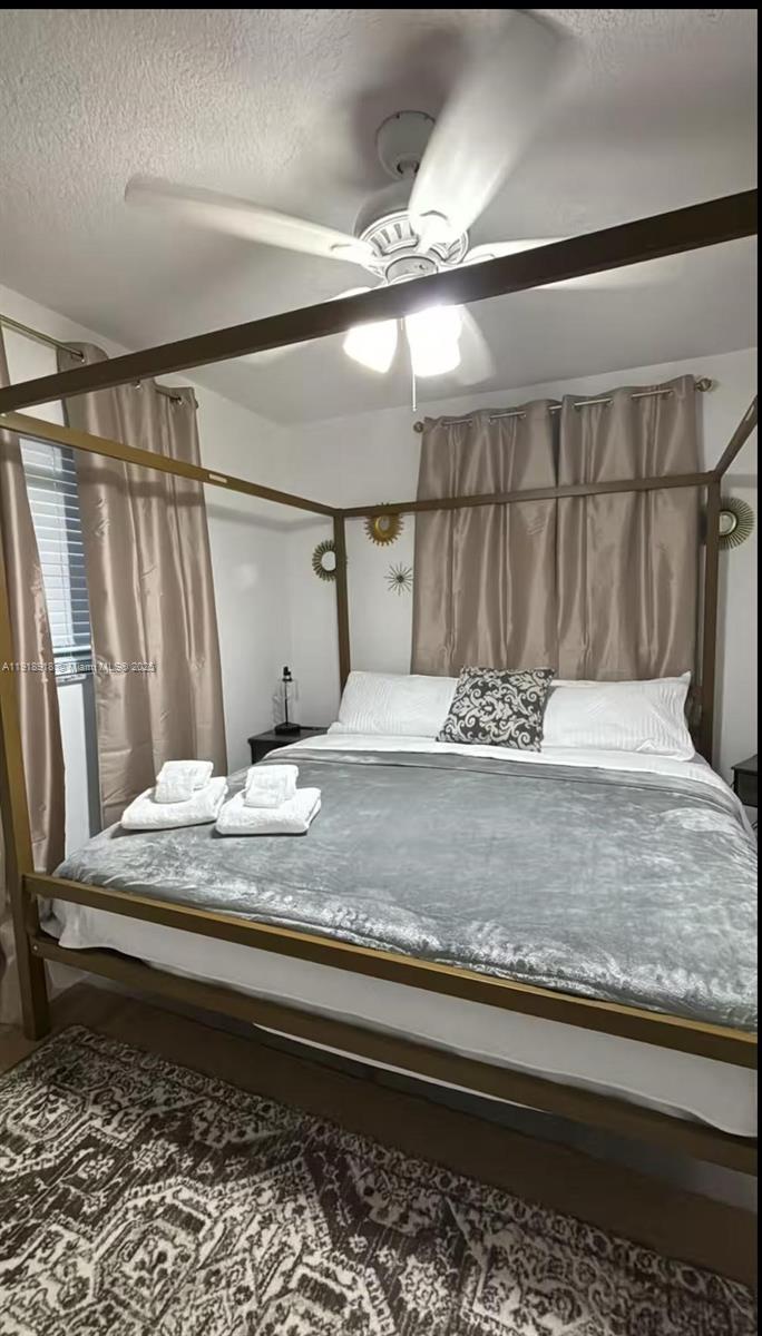 St. Lucie Estates-Broadway Stuart, FL 34996 - Photo 5 of 12 a bathroom with a granite countertop sink and a mirror