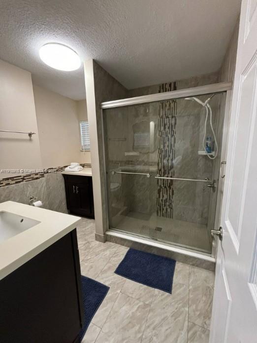 St. Lucie Estates-Broadway Stuart, FL 34996 - Photo 8 of 12 a bathroom with a shower and a sink