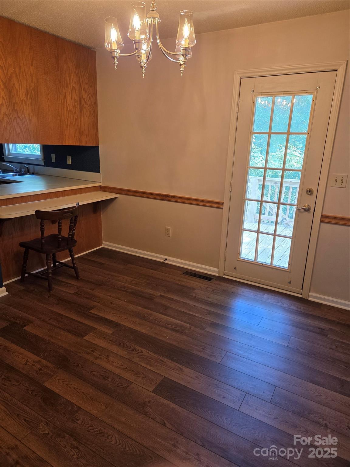 1203 Dudley Shoals Road Granite Falls, NC 28630 - Photo 14 of 32 a view of room with furniture and wooden floor