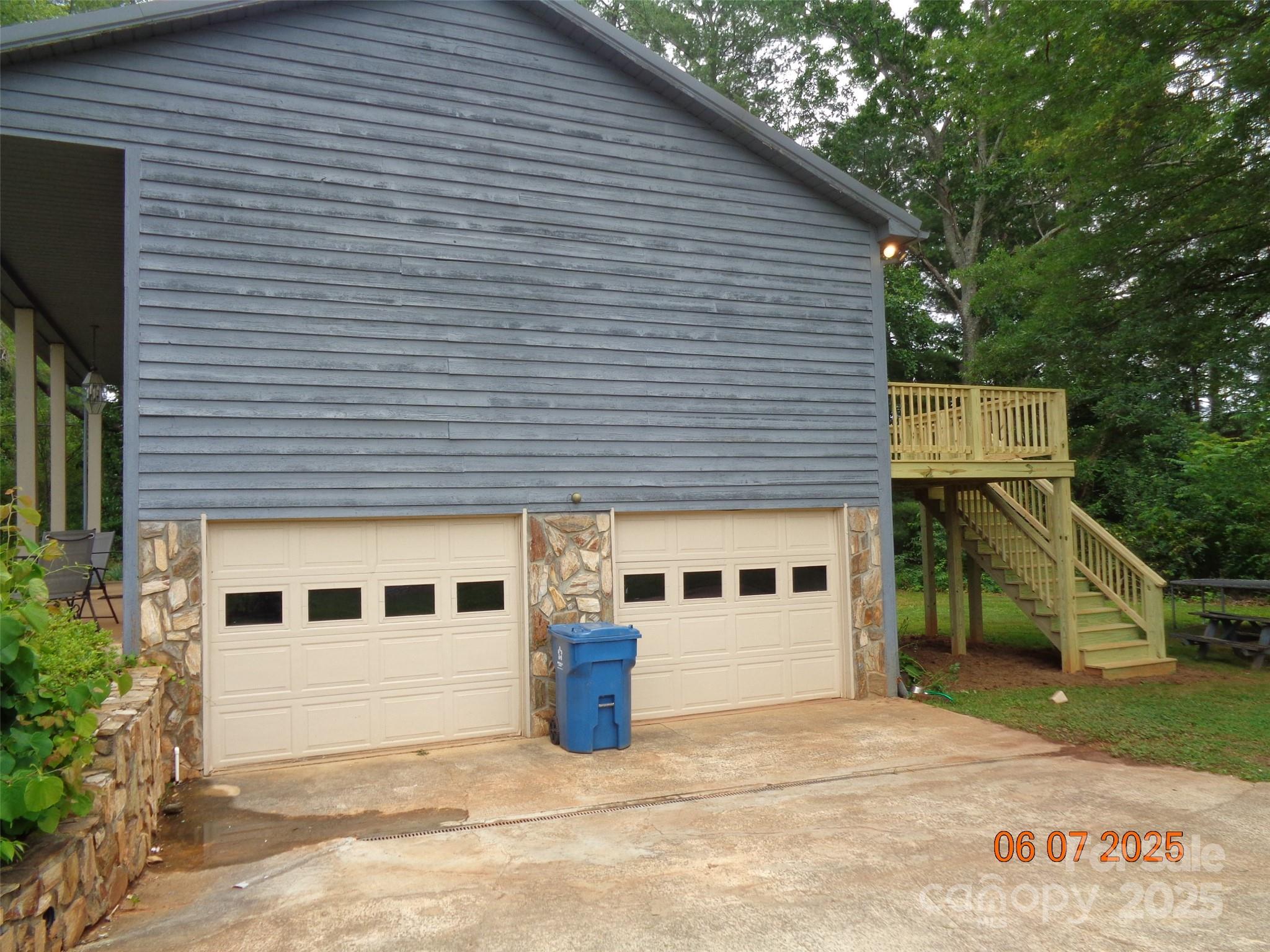 1203 Dudley Shoals Road Granite Falls, NC 28630 - Photo 2 of 32 a view of a house with a backyard
