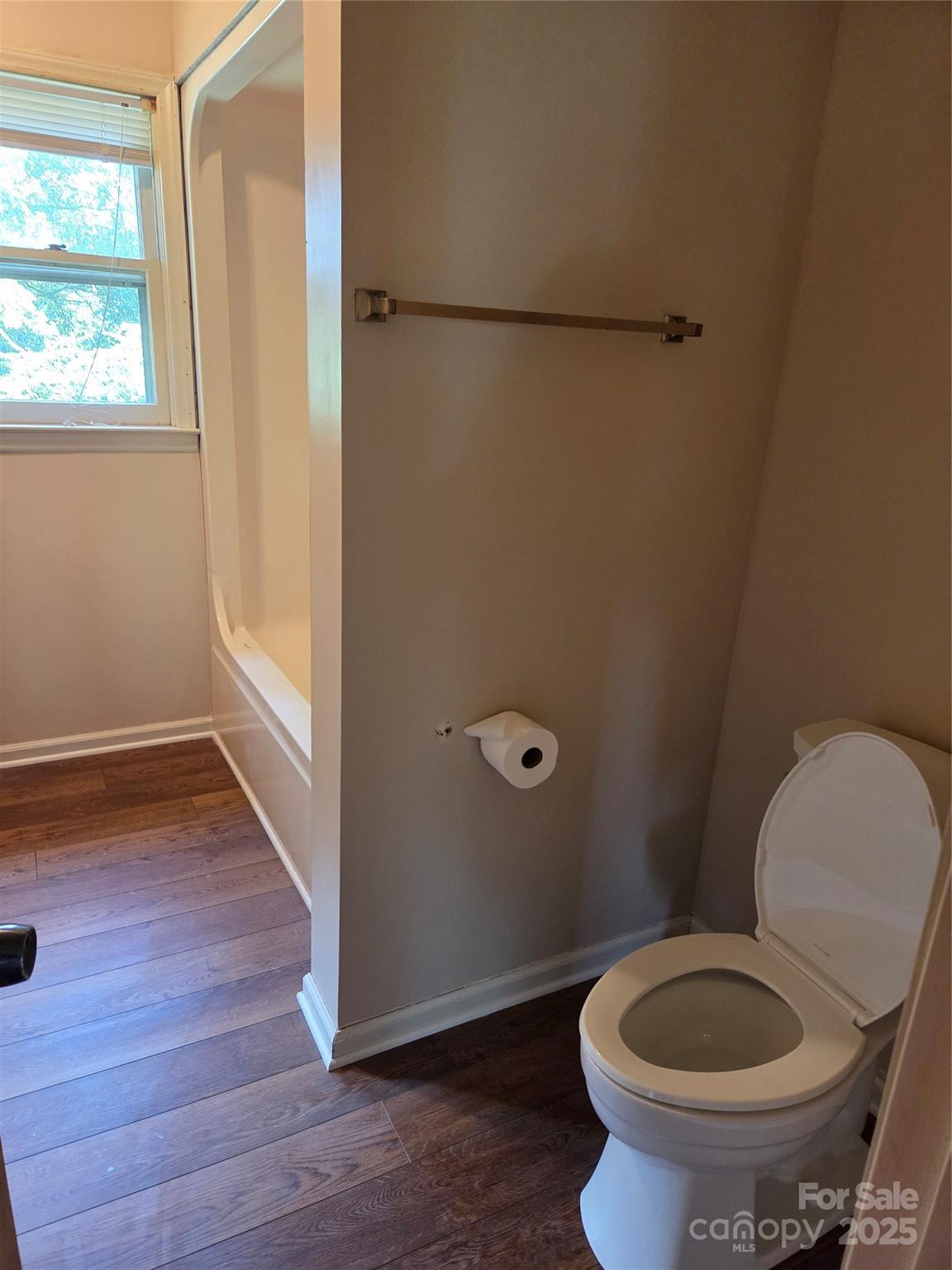 1203 Dudley Shoals Road Granite Falls, NC 28630 - Photo 21 of 32 a bathroom with a toilet and a sink