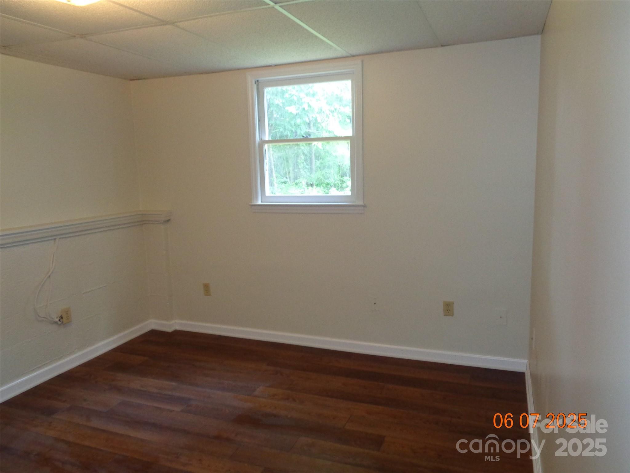 1203 Dudley Shoals Road Granite Falls, NC 28630 - Photo 26 of 32 a view of a small space with wooden floor and a window