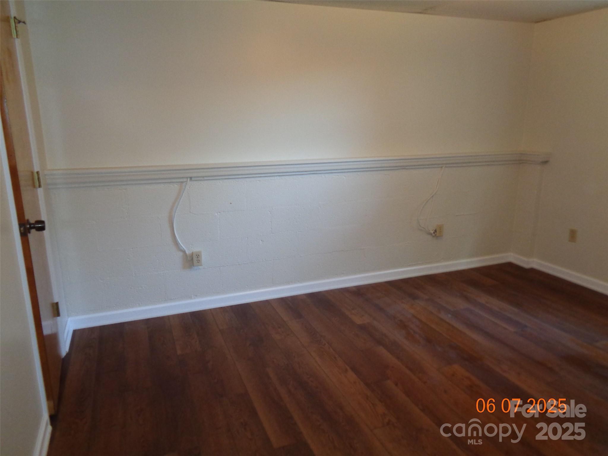 1203 Dudley Shoals Road Granite Falls, NC 28630 - Photo 29 of 32 a view of a room with wooden floor