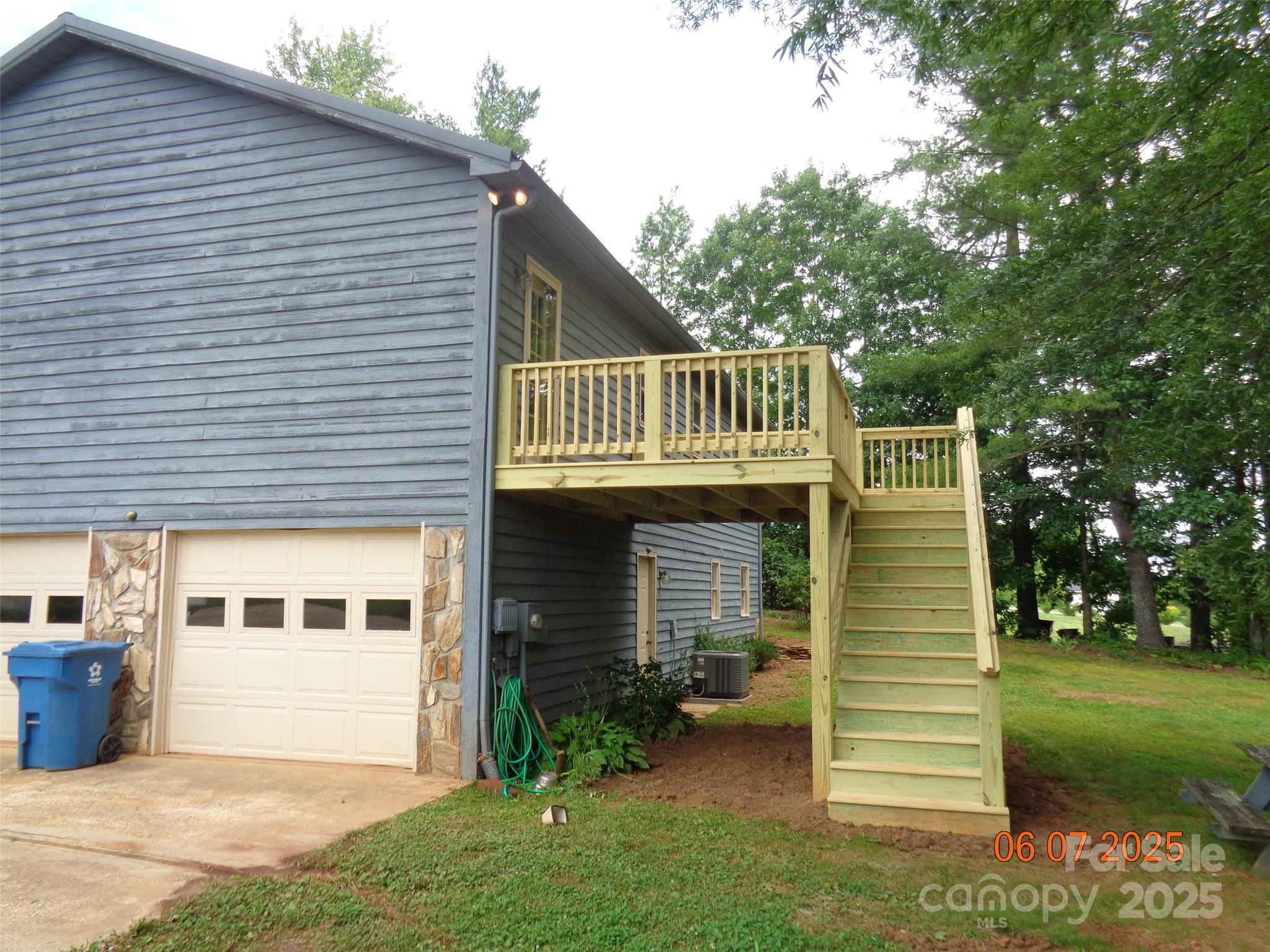 1203 Dudley Shoals Road Granite Falls, NC 28630 - Photo 4 of 32 a view of a house with a yard