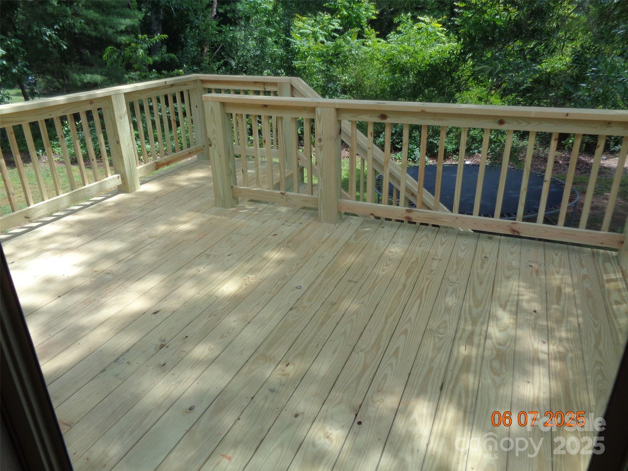 1203 Dudley Shoals Road Granite Falls, NC 28630 - Photo 5 of 32 a view of balcony with wooden floor