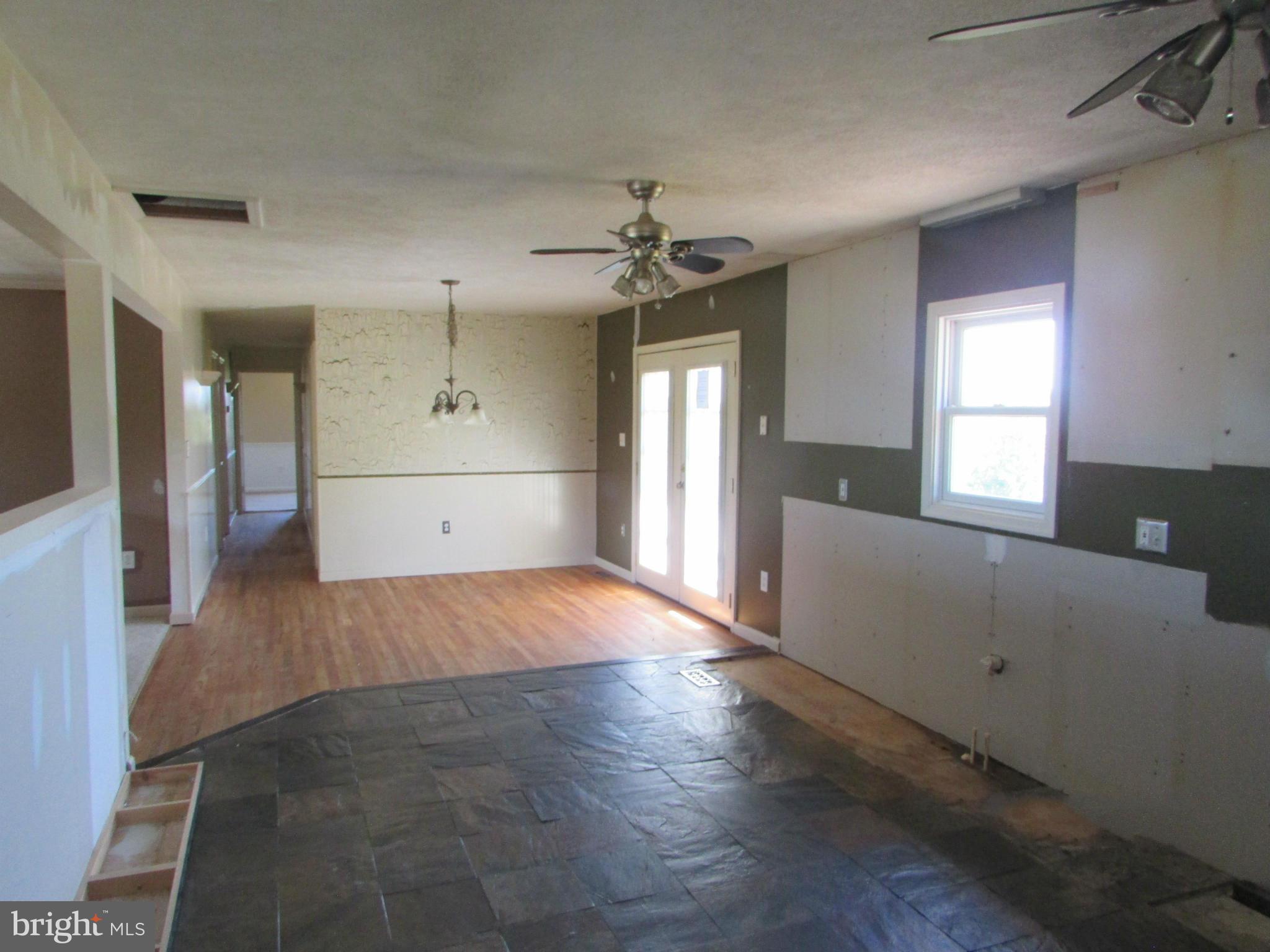 3410 Halter Road Westminster, MD 21158 - Photo 7 of 21 Kitchen w/ceramic floor to dining area w/ wood flr