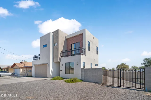 a view of a street with a building in the background