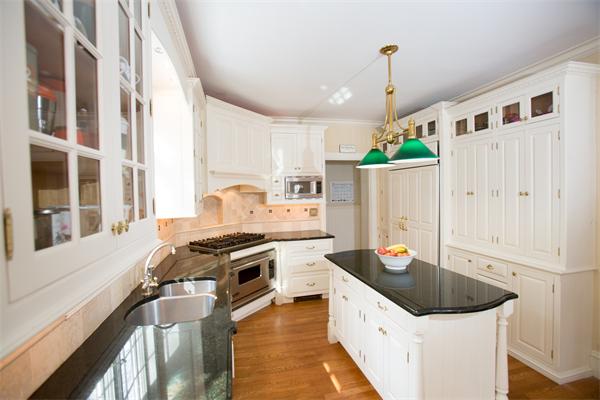 12 Glen Road Wellesley, MA 02481 - Photo 9 of 14 a kitchen with stainless steel appliances granite countertop a stove a sink and a refrigerator