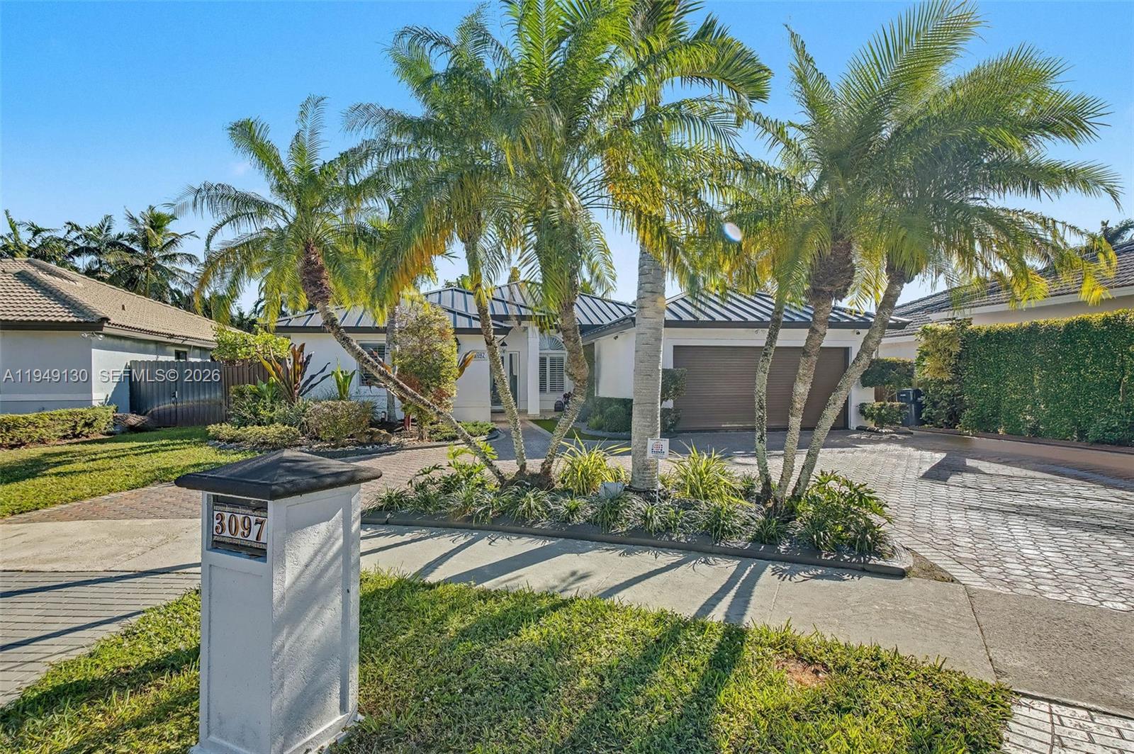 3097 Southwest 132nd Place Miami, FL 33175 - Photo 2 of 26 a view of a backyard with potted plants