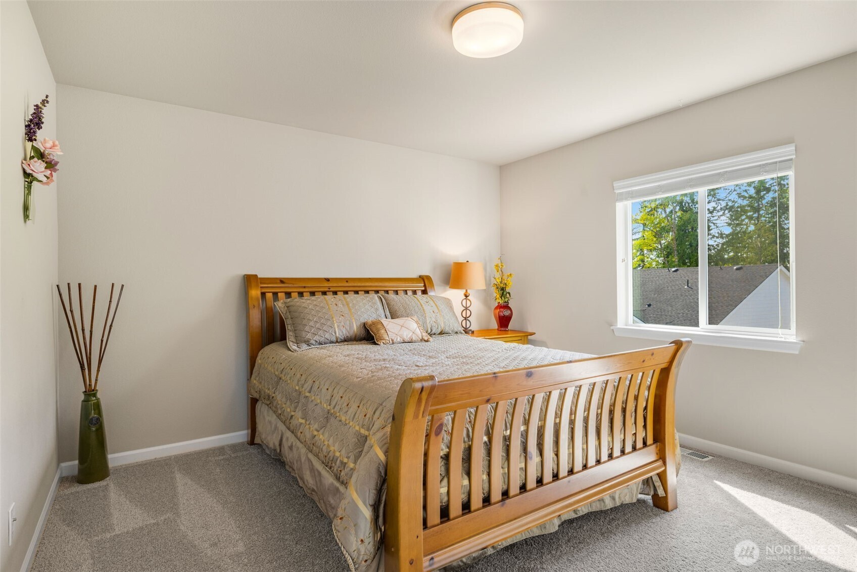 216 178th Street Southeast Bothell, WA 98012 - Photo 30 of 40 a bedroom with a bed and window