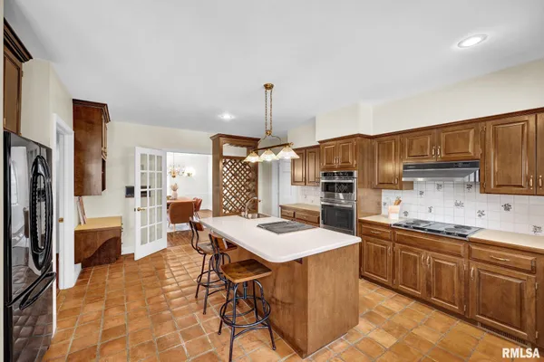 $559,900 | 319 West Ravinwoods Road, Peoria, IL 61615