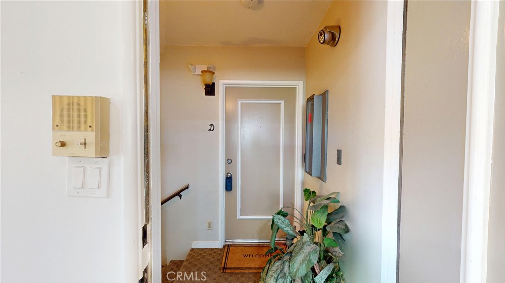 1354 Shadow Fullerton, CA 92831 - Photo 4 of 30 a hallway with painting on the wall