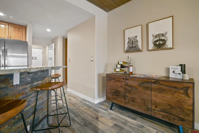 a living room with furniture and a table