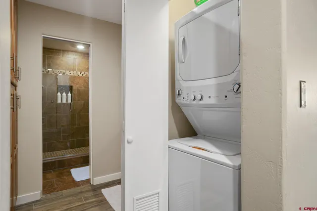 view of bathroom with a toilet and a mirror