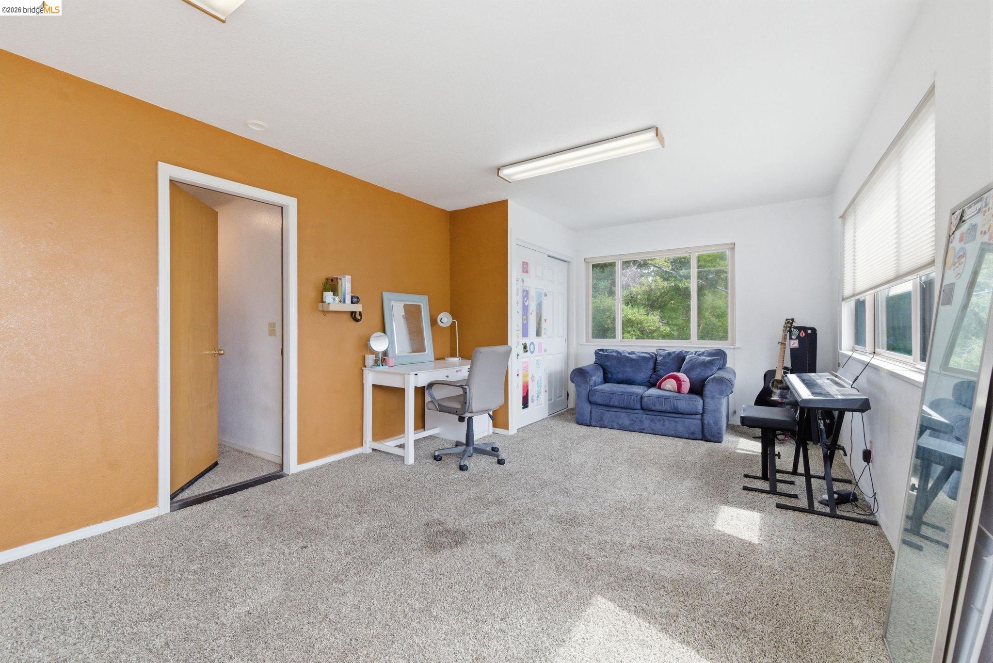 16860 Buckhorn Mountain Road Sonora, CA 95370 - Photo 19 of 46 Carpeted office with baseboards