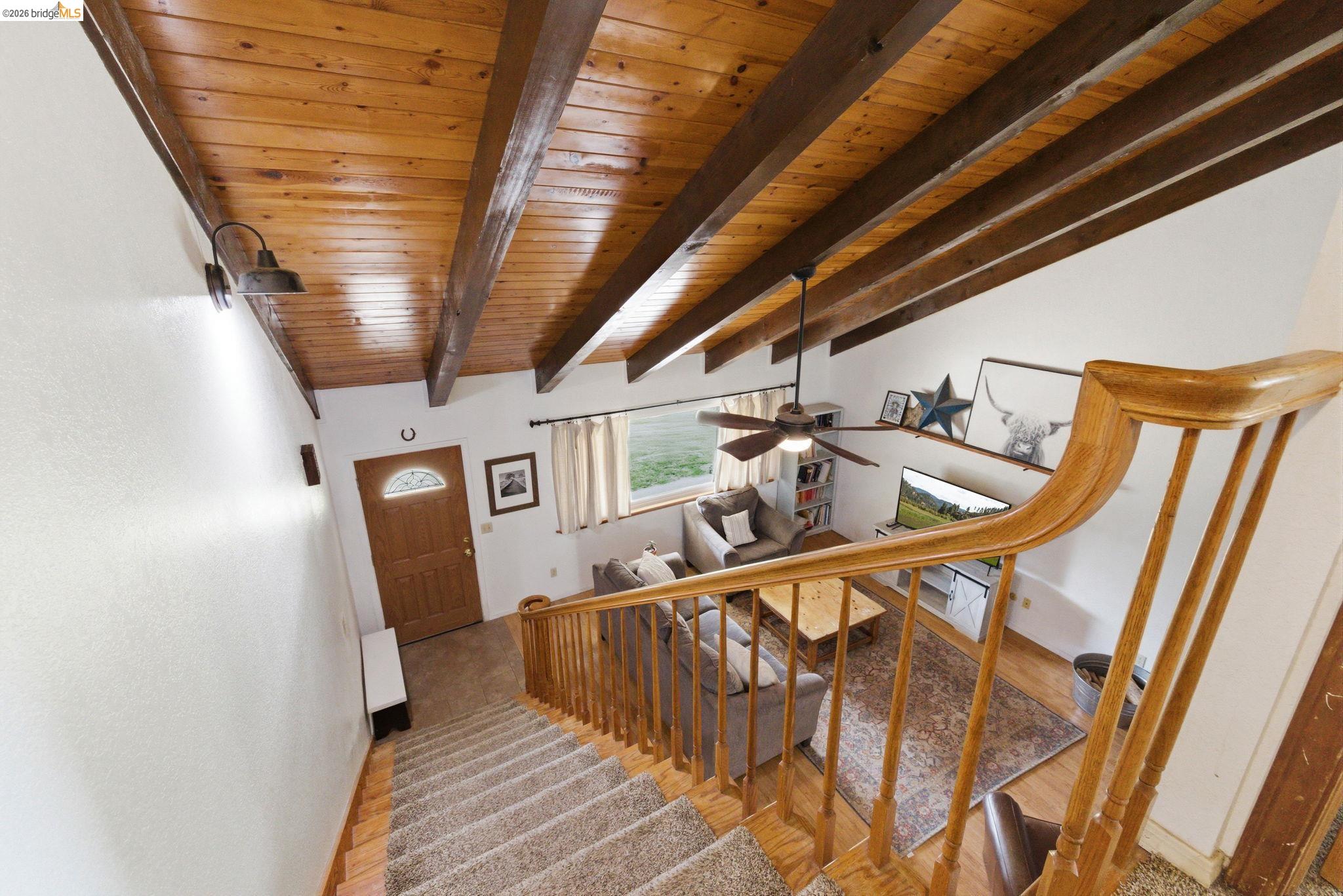 16860 Buckhorn Mountain Road Sonora, CA 95370 - Photo 21 of 46 Foyer featuring wooden ceiling, light wood-style floors, a ceiling fan, and lofted ceiling with beams