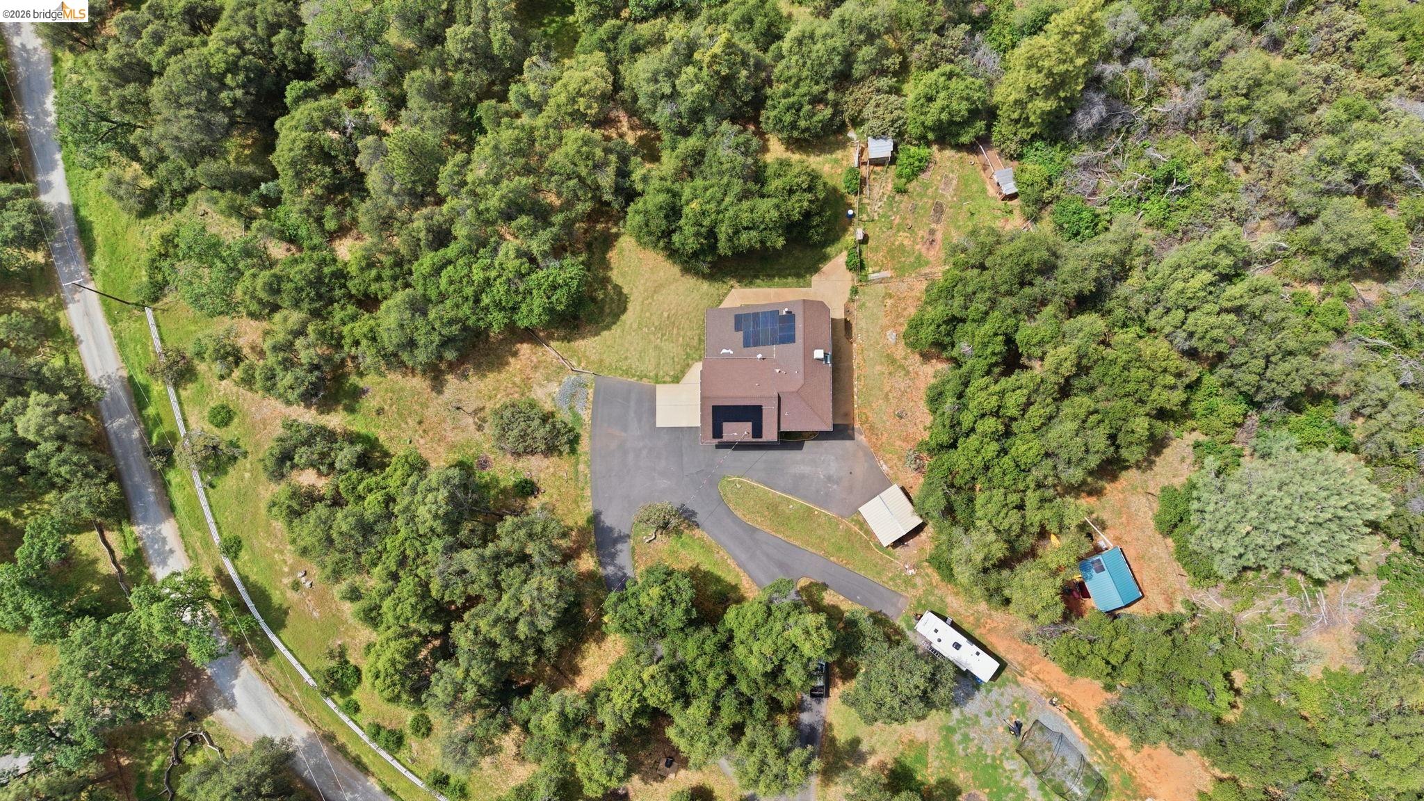 16860 Buckhorn Mountain Road Sonora, CA 95370 - Photo 37 of 46 Aerial view of a heavily wooded area