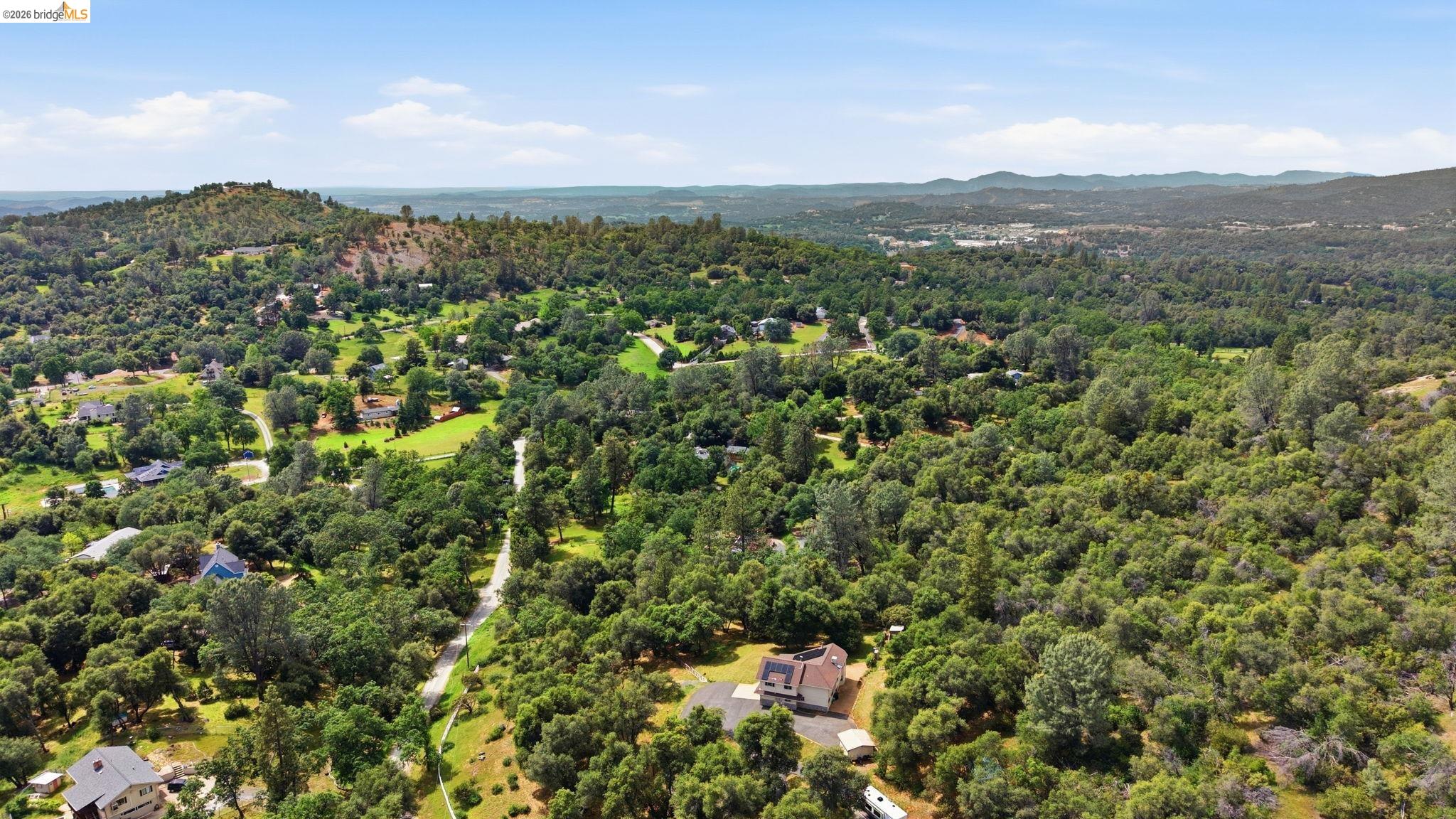 16860 Buckhorn Mountain Road Sonora, CA 95370 - Photo 38 of 46 Bird's eye view of a forest and mountains