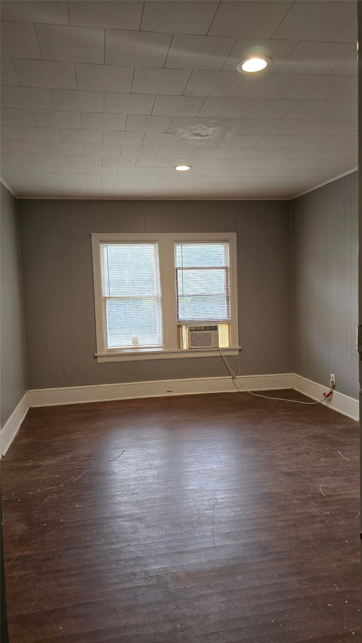 18327 Blake Manor Road, Unit A Manor, TX 78653 - Photo 12 of 21 Unfurnished room with dark wood-type flooring and recessed lighting