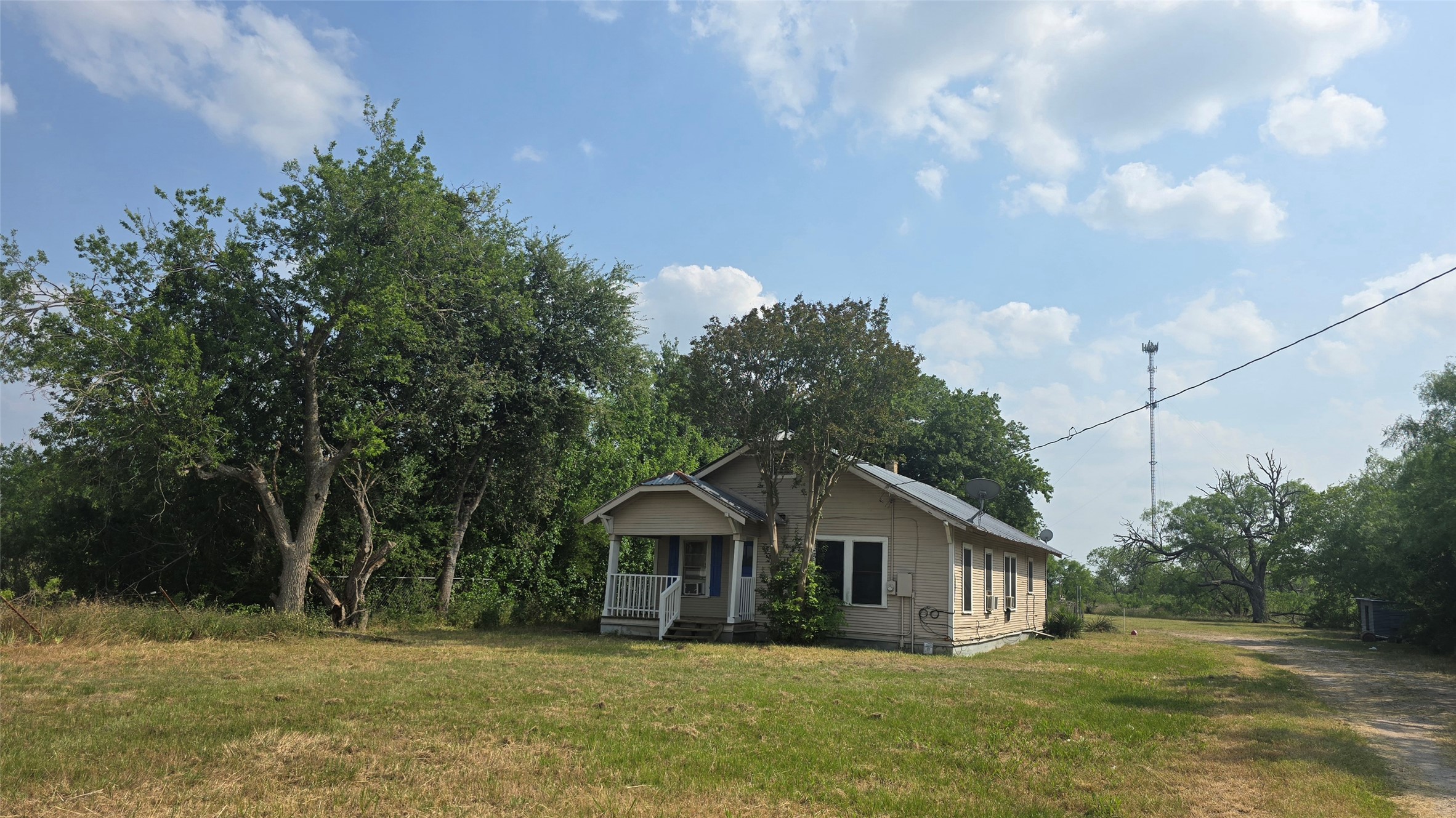 18327 Blake Manor Road, Unit A Manor, TX 78653 - Photo 2 of 21 Bungalow featuring a front yard and covered porch