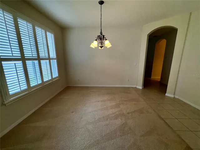 a view of a room with windows