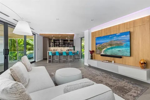 an aerial view of a house with swimming pool