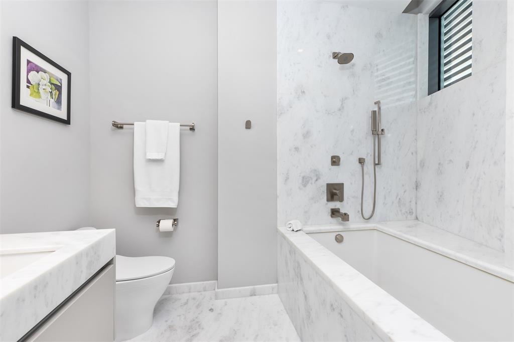 34 Minnetonka Road Sea Ranch Lakes, FL 33308 - Photo 35 of 89 a bathroom with a bathtub and a toilet